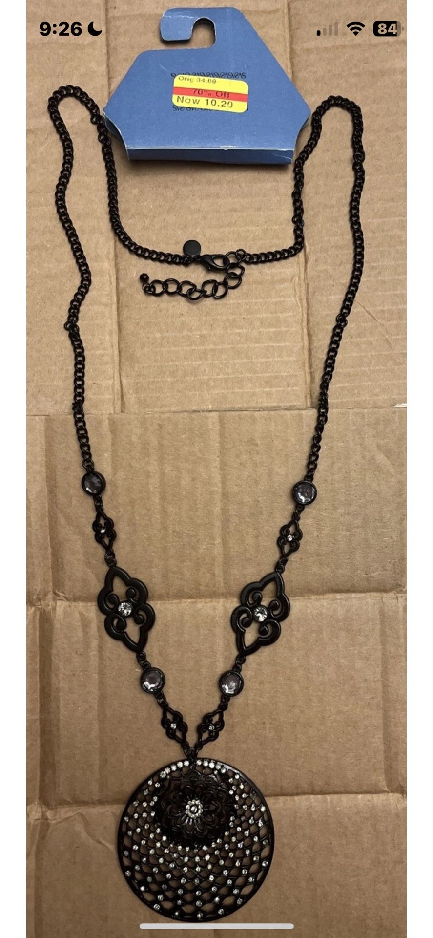 Black metal Simply Vera, Vera Wang long pendant necklace with rhinestones.