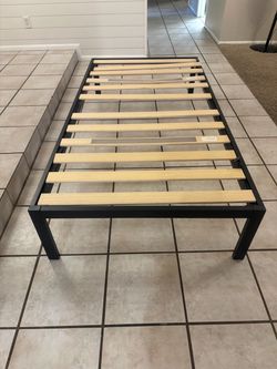 Two twin bed frames
