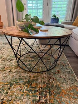 Round wood coffee table