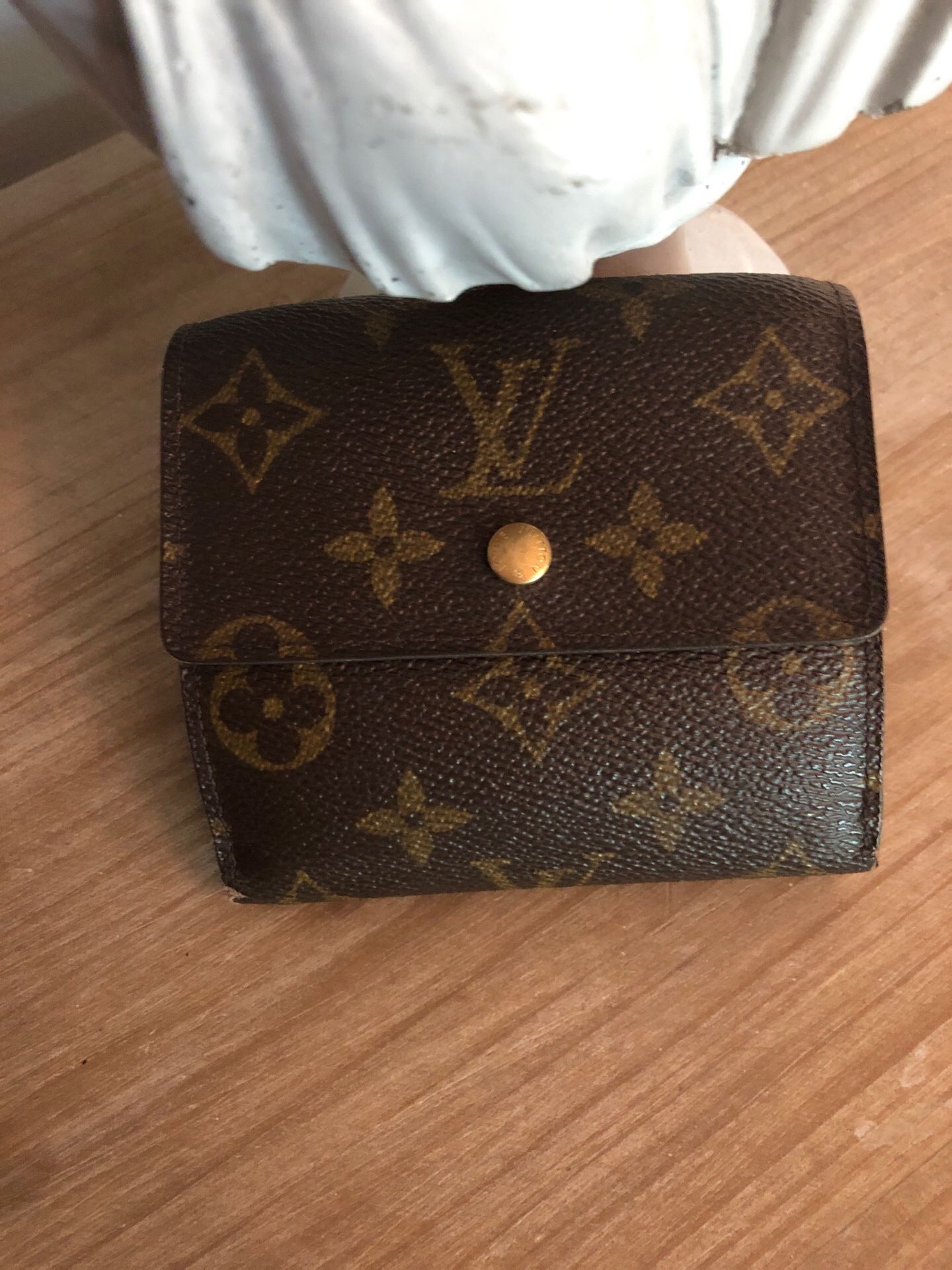 Louis Vuitton compact monogram wallet