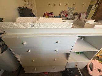 Changing table with mattress and drawers