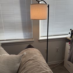 Floor lamp with cream shade