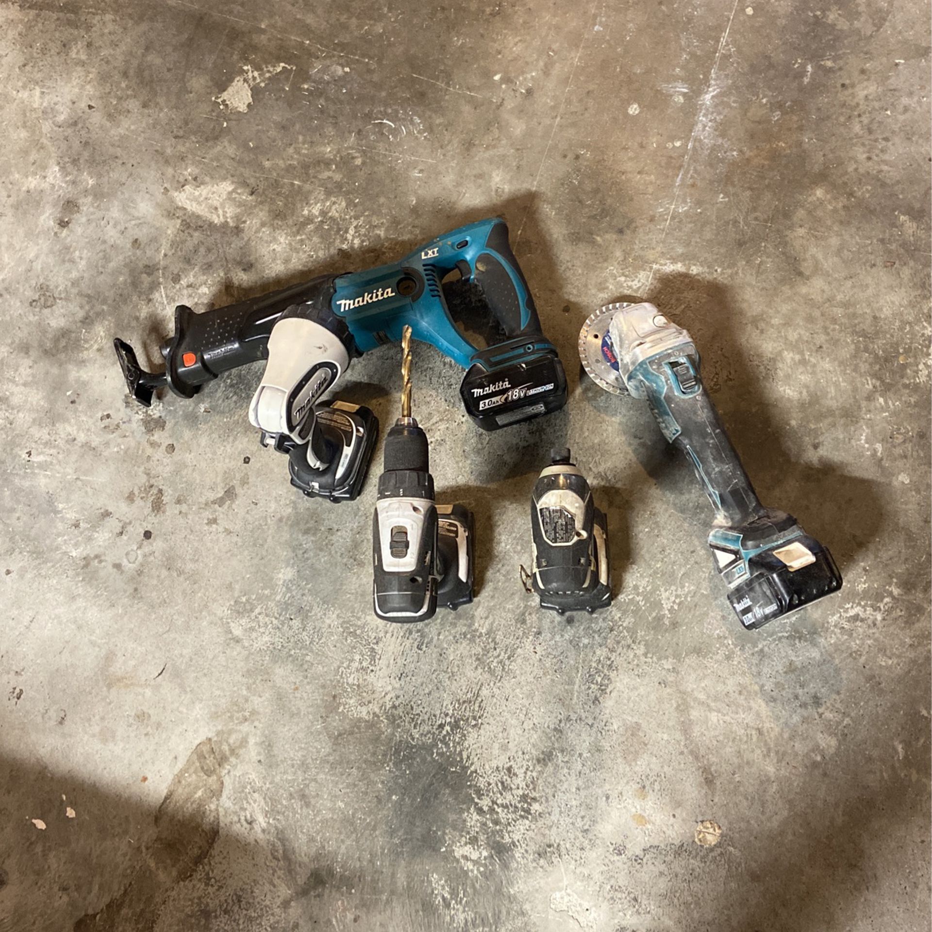 Makita cordless tools with batteries and charger