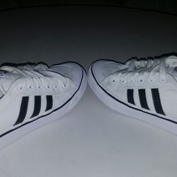 Adidas canvas 
"Size 5.5 women"