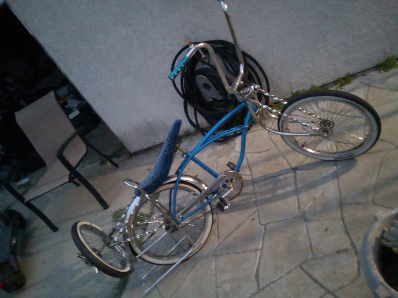 Blue lowrider Bike,