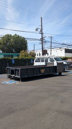 Roll off lowboy dumpsters
