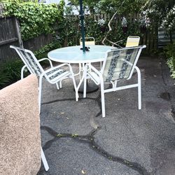White Table And 4 Chairs