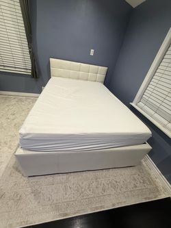 Full size bed frame with twin pull out