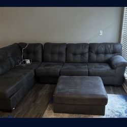 Grey Sectional And Ottaman Set