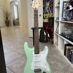 Teal Fender Squire Stratocaster 