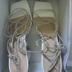 Women’s brand new white/silver heels