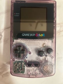 Nintendo Game Boy Color - Atomic Purple with matching pelican accessories and Nintendo case