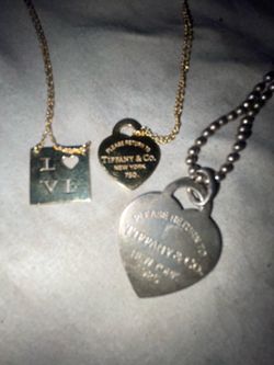 Return to Tiffany gold heart pendant and silver