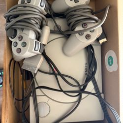 Playstation With Games, Two Controllers And One Memory Pack