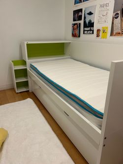 Twin size bed with storage and pull out bed