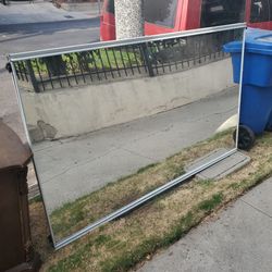 Two White closet mirror doors. 78H x 48W