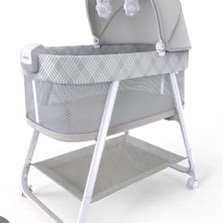 Ingenuity Lullanight Soothing Bassinet 33.4x20.6x43.8"  Open box item box is damaged   INVENTORY NUMBER: 101(contact info removed)