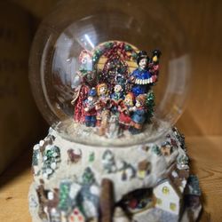 C-03...Kirkland Signature musical snow globe with  carol singers