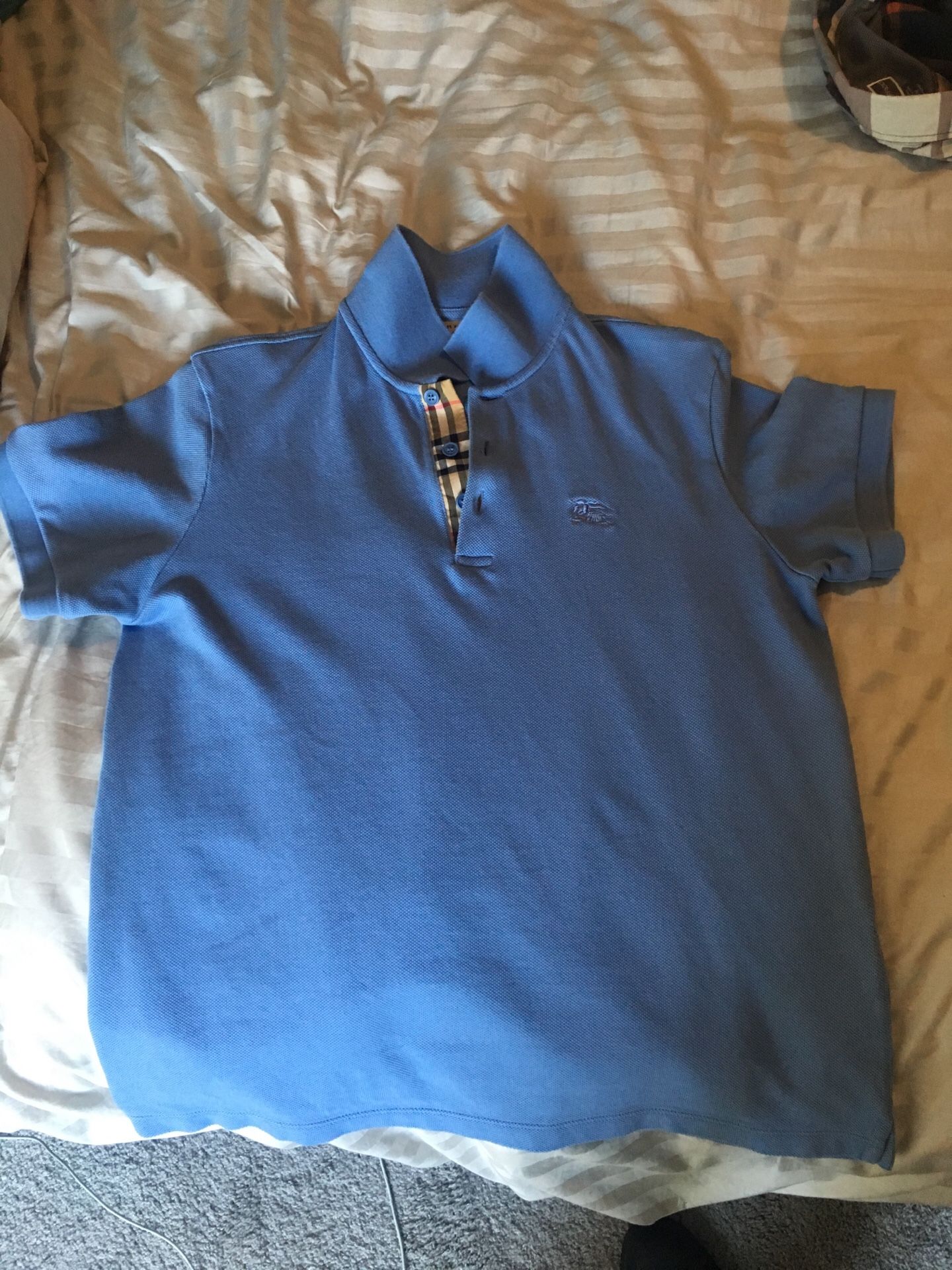 Brand New, never used Burberry polo Large.