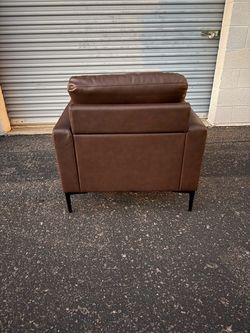 Brown leather chairs