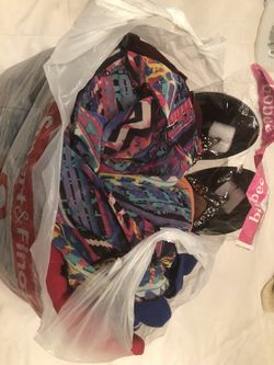 Bag full of women clothes and shoes