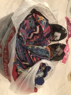 Bag full of women clothes and shoes