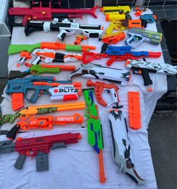 $120  O.B.O .21 Nerf guns AND two RPNT Nerf rival customizable Overwatch guns
