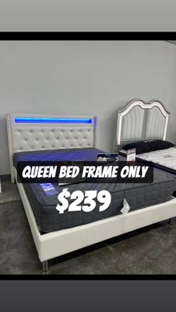 Queen bed frame only / mattress sold separately