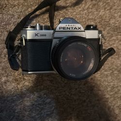 Asahi Pentax K1000 (with a 50 mm lens)