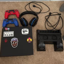 Ps4 with 2 controllers and turtle beach headset and charging and cooling station 
