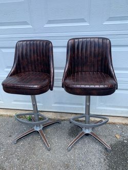 2 Bar Height high chairs . Heavy dutyFaux Leather base and back rest