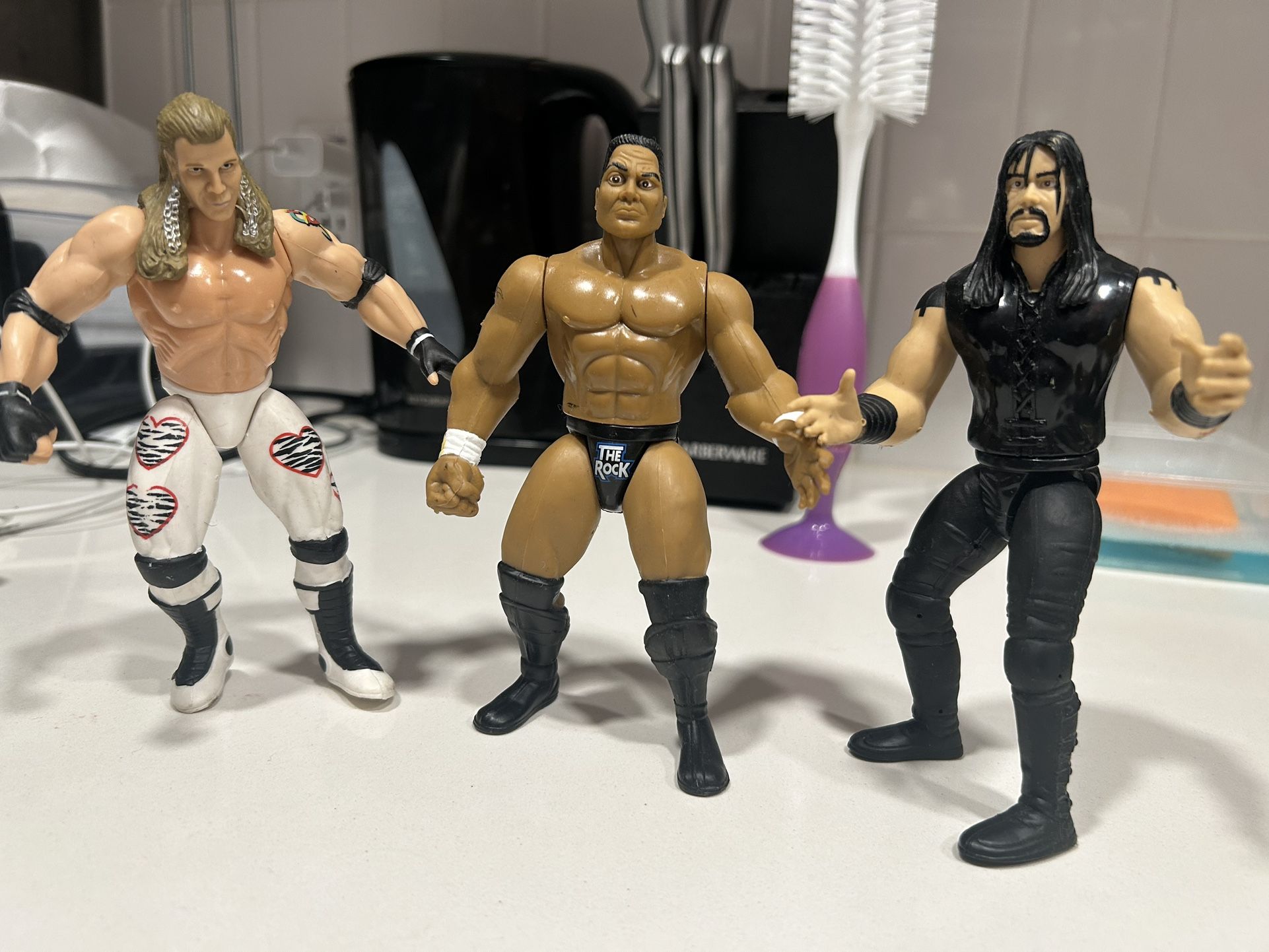 Shawn Michaels, The Rock, The Undertaker