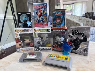 Junk drawer lot of Funko, King Kong signed trading card sdcc, video games replica and Japan