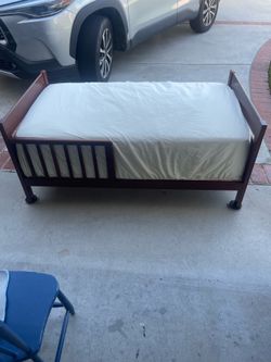 Toddler bed with two mattresses