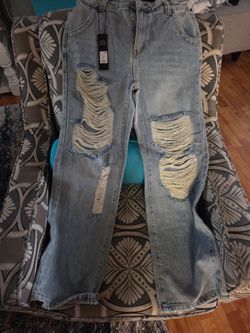 Light Wash Heavily Distressed Jeans with Tags