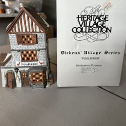 Dicken’s Village Retired Poulterer