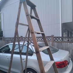 8 foot vintage step ladder for electric, decorative use, or repair

This ladder is old, but I think it's still got some life left in it. 