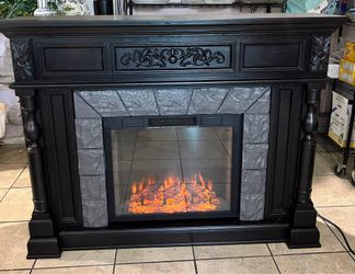 Electric fireplace with mantel