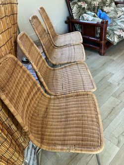 IKEA vintage wicker chairs 50.00 all 4 chairs.  Usable.