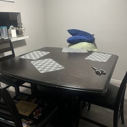 Table With Chairs For Sell 