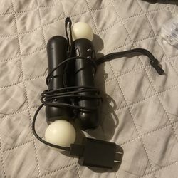 two PlayStation Move motion controllers
