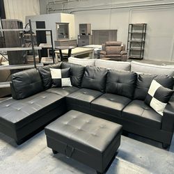 Black vinyl sectional with FREE OTTOMAN
