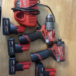 Milwaukee M12 Impact Driver And Hammer Drill 