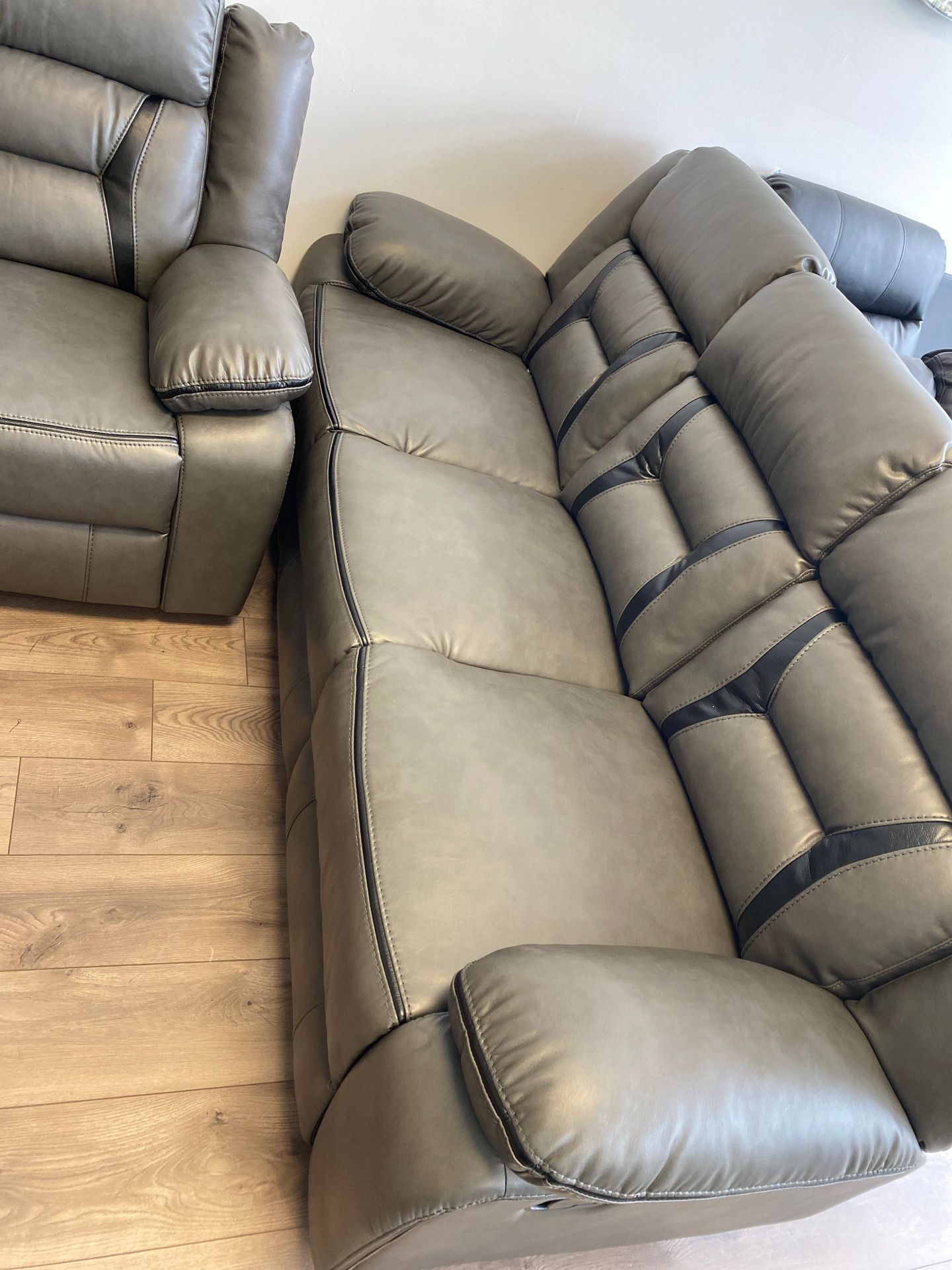 Leather recliner sofa and loveseat
