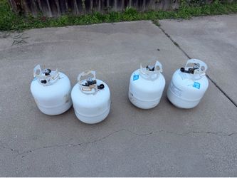 4 Empty Propane Tanks – Ready for Exchange or Refill