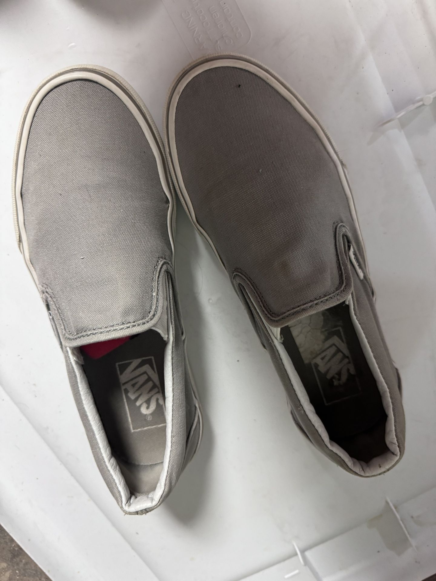 Woman’s Grey slip on vans Size 7