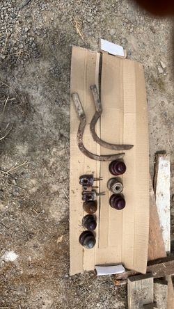 Antiques insulators and hand sickle all