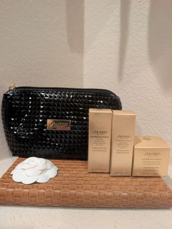 Shiseido Future Solution LX line with black quilted cosmetic pouch
