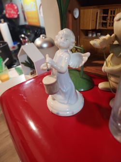 Porcelain Angel Beatin A Drum