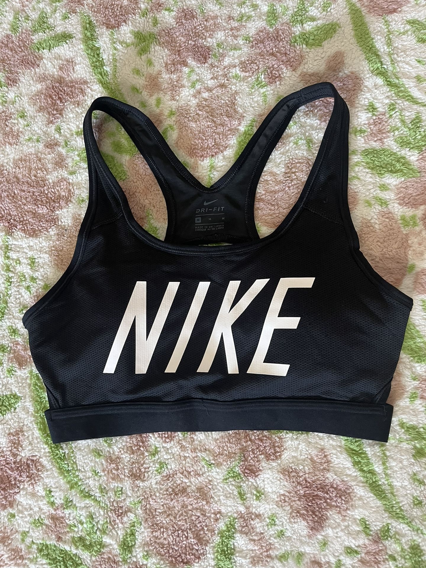 women’s activewear black Dri-Fit bra - Nike